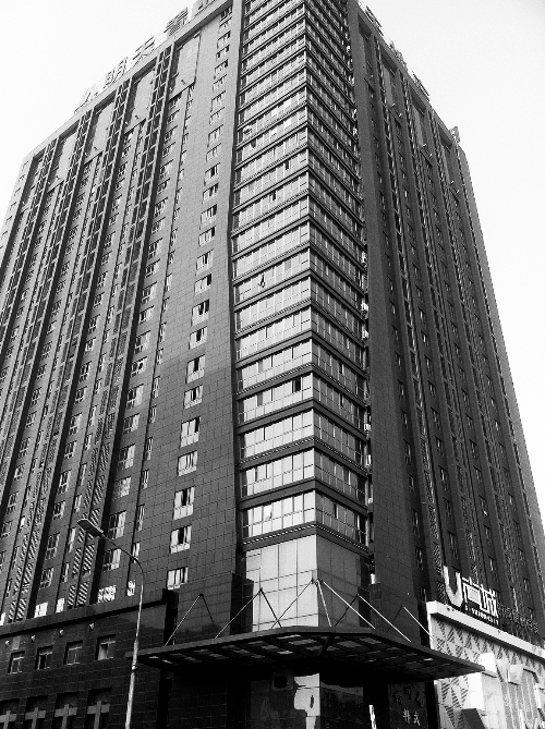 記者按照公開地址在鄭州一處寫字樓尋找一家軟件公司，一無所獲。