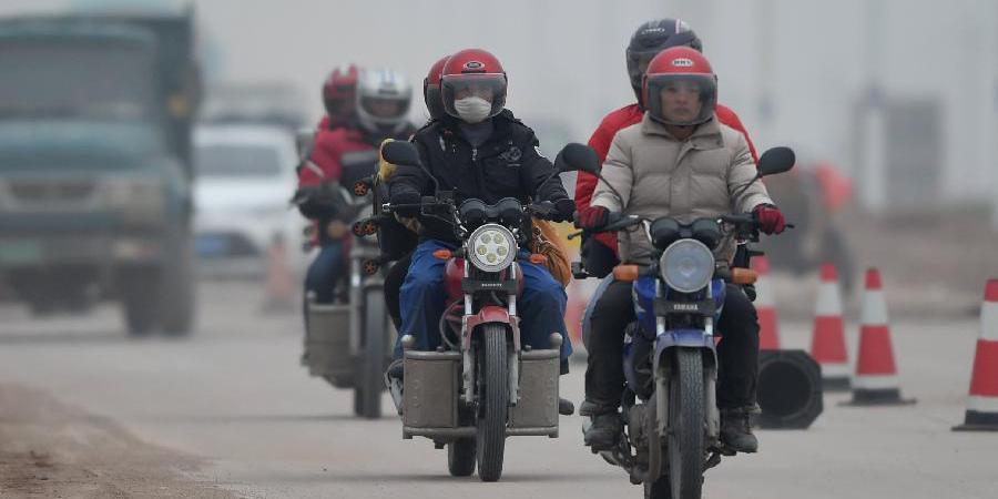 不畏風(fēng)雨 只為回家 不畏風(fēng)雨 只為回家
