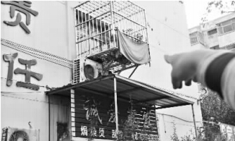 發(fā)生矛盾的一二樓鄰居，喇叭就安裝在二樓窗口。